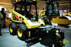 Smykem řízený nakladač Caterpillar 226B Series 3 HF se silniční frézou PC205B