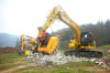 06. Pásové rypadlo Komatsu PC240NLC-11 z půjčovny DEK s drticí lžící Hartl Crusher HBC 650
