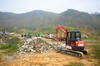 13. Pásové minirypadlo Kubota U48-4 s hydraulickým kladivem Epiroc SB 202 z půjčovny DEK
