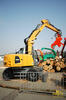 Kolové rypadlo Liebherr A 916 s kácecí hlavicí Westtech Woodcracker C 550