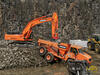 Kloubový dempr Doosan DA 40, pásový bagr Doosan DX 490 LC