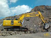 Pásové rypadlo Komatsu PC240LC-10 s vibrujícím rozrývačem Grado Cero Xcentric Ripper XR 30 v akci