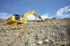 Atlas Copco - pásové rypadlo Komatsu PC490 s kladivem Atlas Copco HB 4700