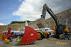 Renomag - lžíce Renomag XXHD 4,55 m3 na Komatsu PC850, v pozadí Volvo EC300E L
