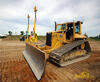 Dozer s 2D laserovou nivelací