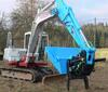 Integrovaný drapák lze použít i s upnutou lžící - naklápěcí rotátor Steelwrist na rypadle Takeuchi TB175