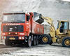 Caterpillar 936E nakládá