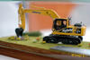 Gratulace přímo od Komatsu v podobě modelu pásového rypadla HB215 LC