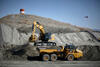 Kolové rýpadlo Cat 340F a dampr Cat 725C