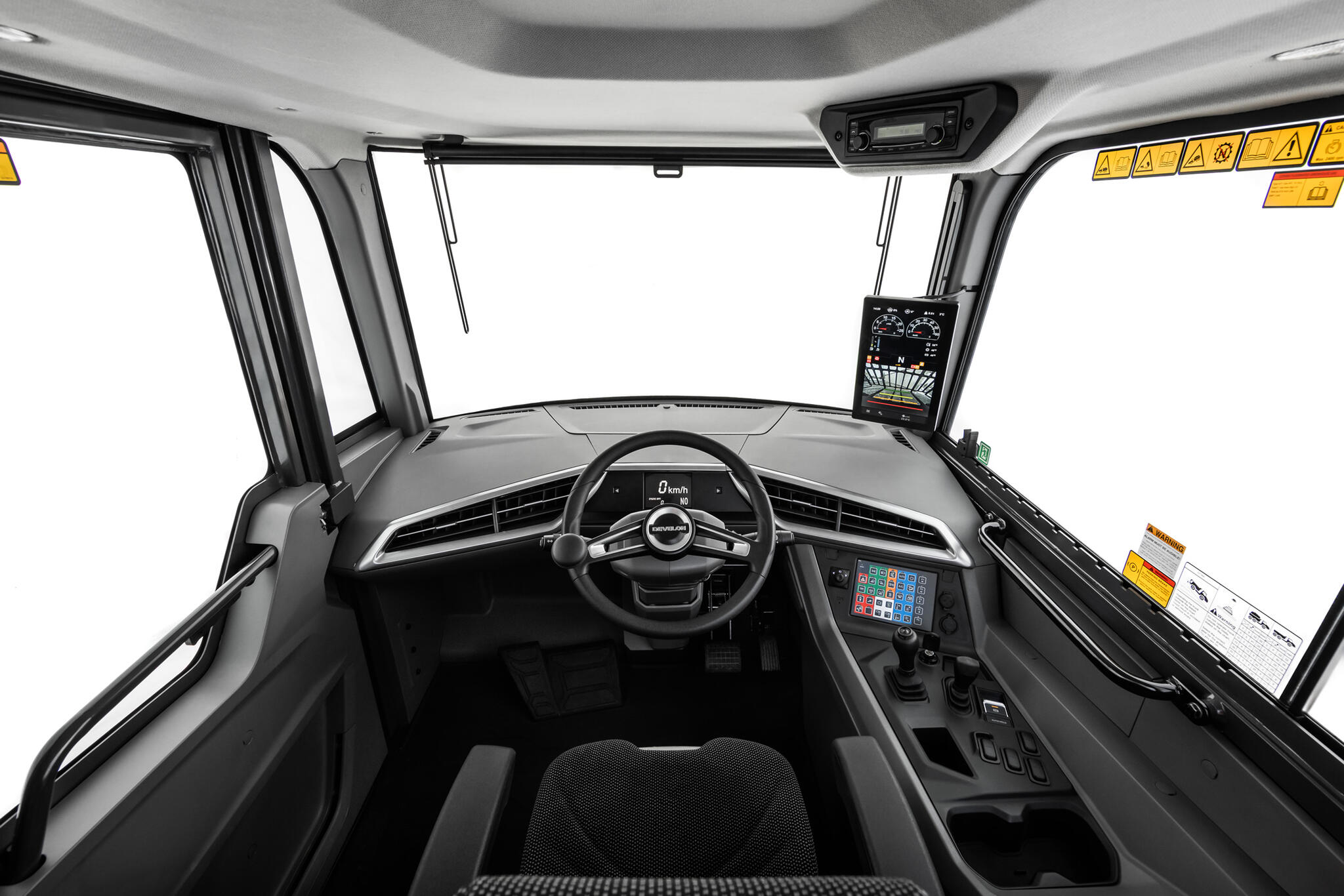 Develon představuje modernizovanou kabinu  kloubových sklápěčů (ADT)