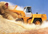 Kolový nakladač JCB 413 při práci (1979)