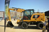 12. Kolové rypadlo Caterpillar M314F